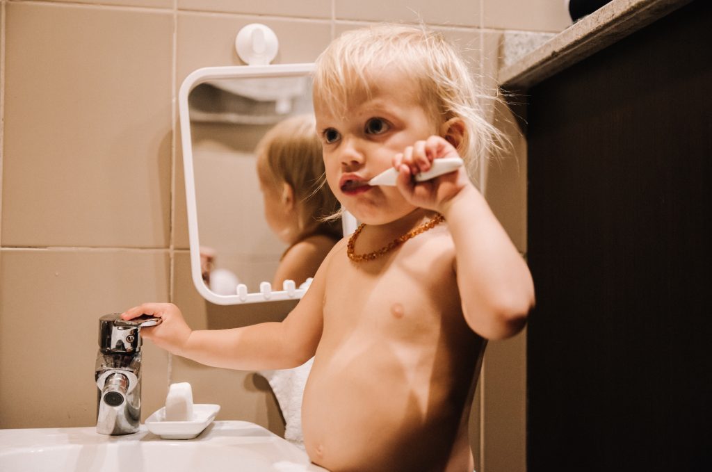Two year old brushing teeth